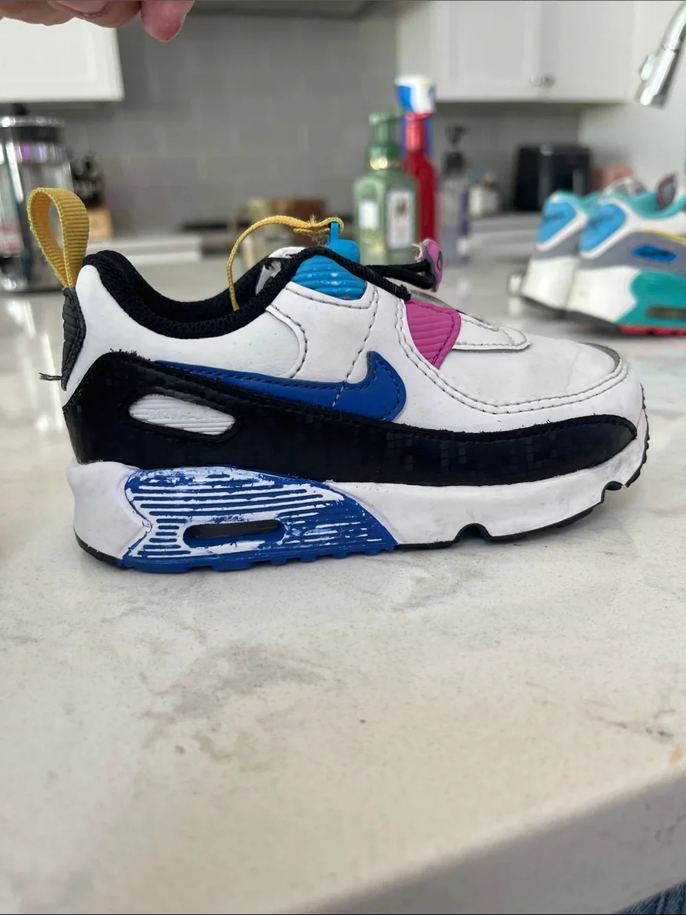 Nike White Kids Sneakers with Pink, Blue & Yellow Accents